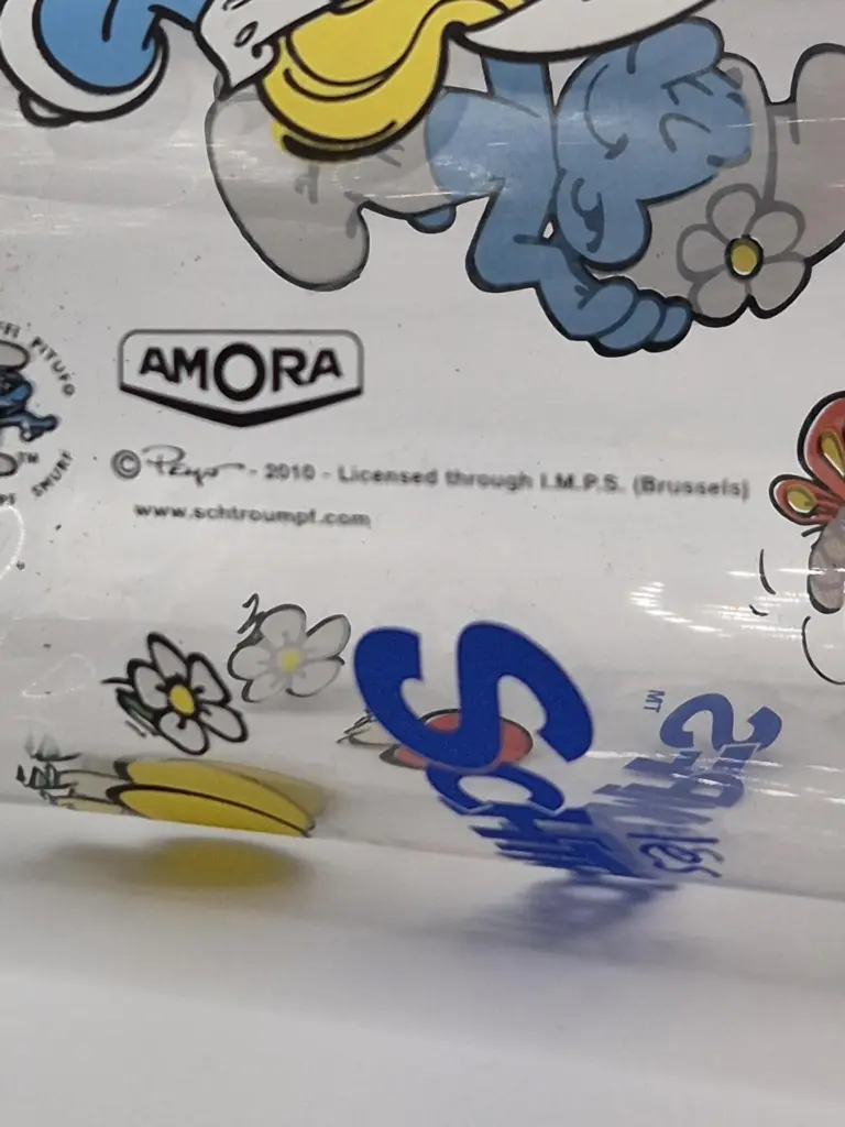 Verre Schtroumpfs Amora – Schtroumpf coquet & Schtroumpfette – illustration officielle Peyo 2010 IMPS