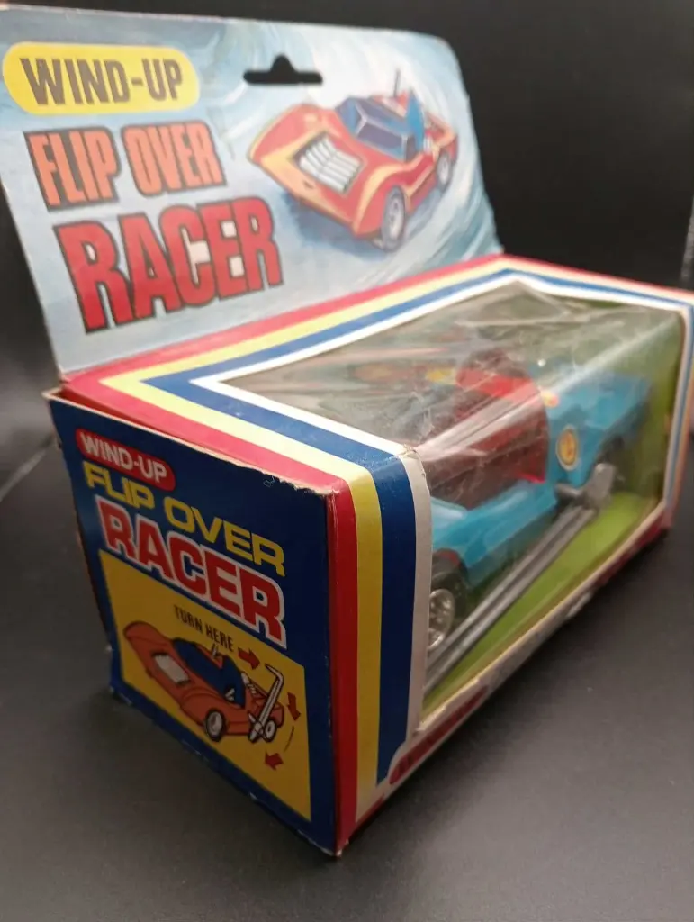 Voiture jouet Flip Over Racer à ressort vintage + boîte