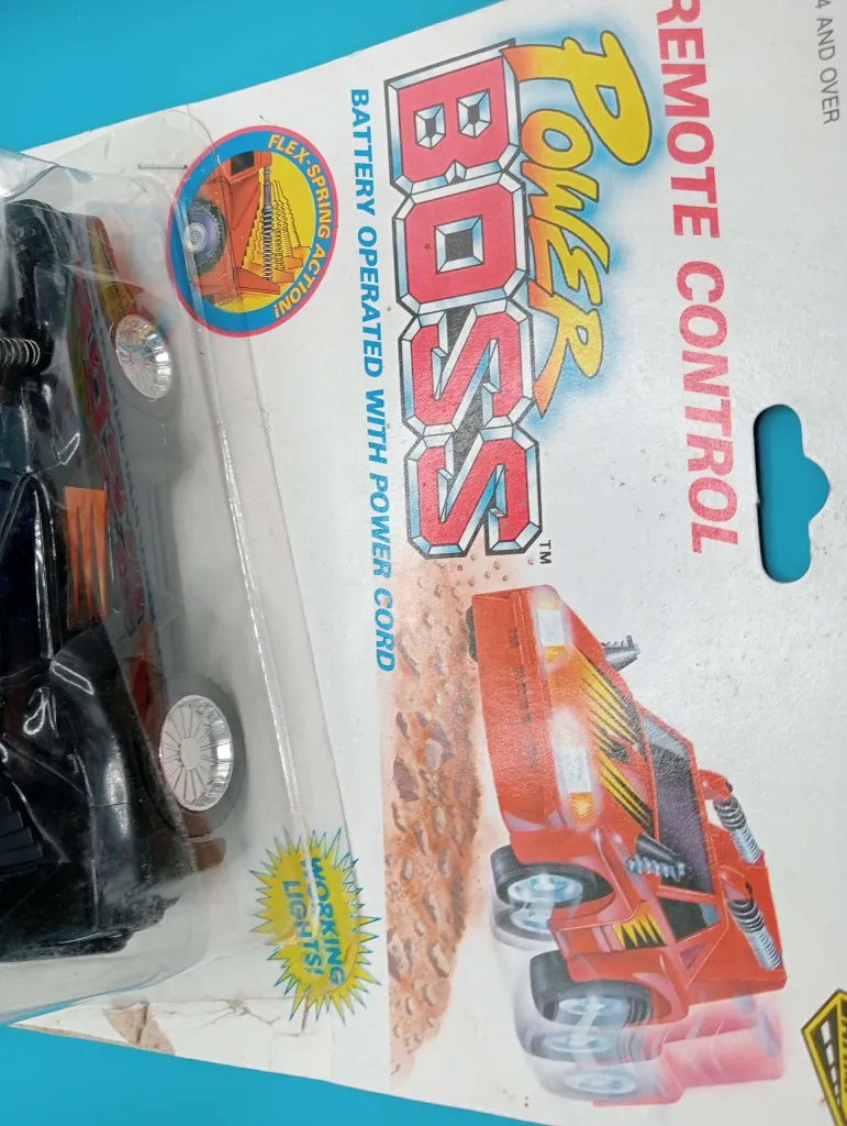 Voiture télécommandée vintage Power Boss – Road Champs 1990