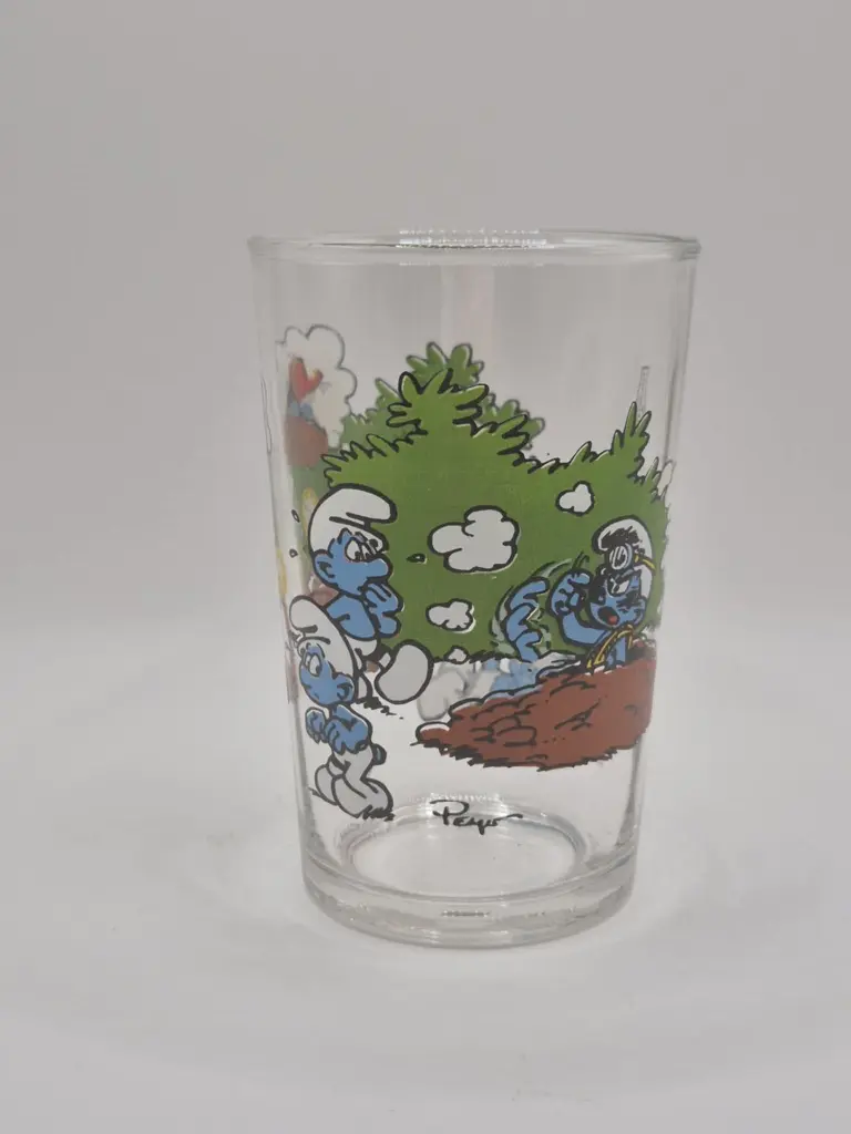 Verre schtroumpfs Bénédictin 1994 - explosion d'un trou de taupe