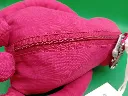 Ensemble Kipling rose vif : sac et singe en peluche