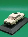 Volvo 244GTX (1/43) — berline die-cast crème