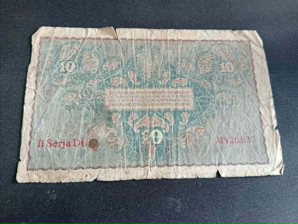 Billet polonais 10 marek – Polska Krajowa Kasa Pożyczkowa – 1919 – billet de banque – vintage – recto texte orné et verso motifs floraux.webp