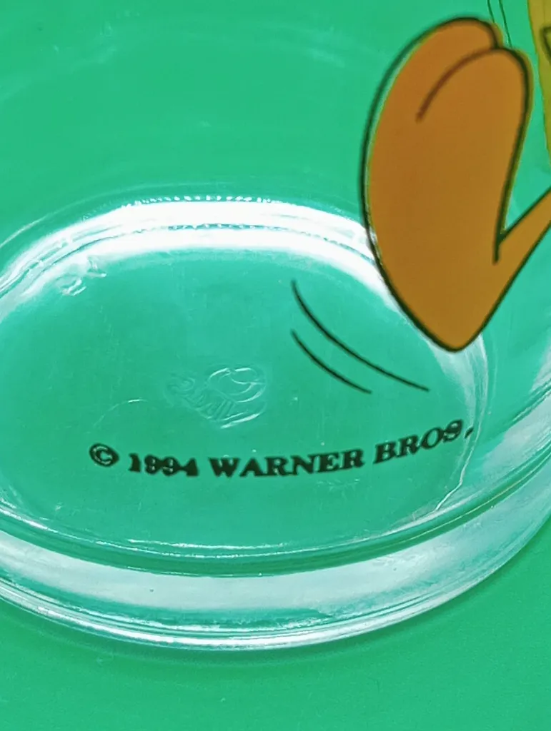 Verre Tweety 1994 – Looney Tunes – décor jaune – texte Tweety – Warner Bros