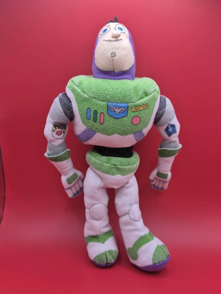 Peluche Buzz l’Éclair 28 cm – Toy Story – costume vert blanc violet – version souple