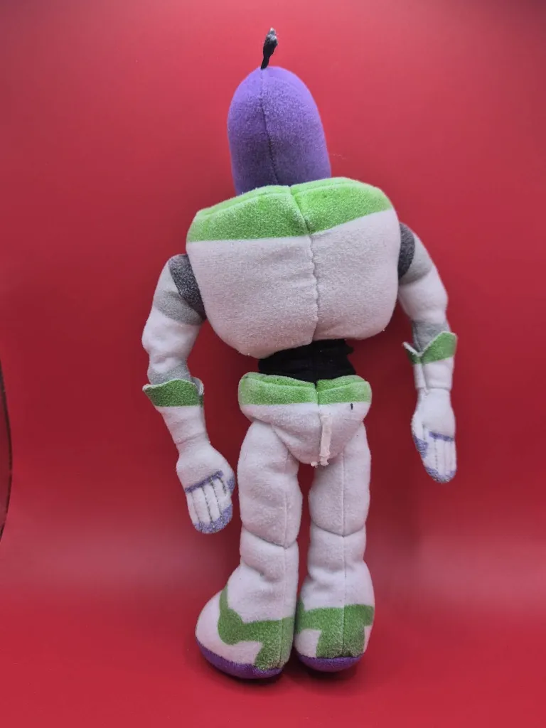 Peluche Buzz l’Éclair 28 cm – Toy Story – costume vert blanc violet – version souple