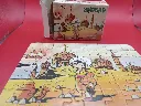 Mini-puzzle Sindbad – FX Schmid – 1978 – jeu de patience miniature en carton – vintage – boîte rectangulaire illustrée montrant Sindbad devant des palais orientaux avec logo trèfle rouge FX Schmid et mention Made in West Germany