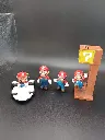 Lot de 4 figurines Super Mario Nintendo – Mario en kart, Mario classique, Mario sous bloc mystère et Mario personnage ailé – figurines en plastique – couleurs d’origine – état d’usage
