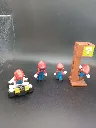 Lot de 4 figurines Super Mario Nintendo – Mario en kart, Mario classique, Mario sous bloc mystère et Mario personnage ailé – figurines en plastique – couleurs d’origine – état d’usage