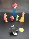 Lot Mario – tête Mario sur support bleu – Donkey Kong – Koopa jaune – Shy Guy rouge – Princesse Daisy – Bill Balle noir et pièce jaune – figurines en plastique