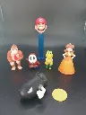Lot Mario – tête Mario sur support bleu – Donkey Kong – Koopa jaune – Shy Guy rouge – Princesse Daisy – Bill Balle noir et pièce jaune – figurines en plastique