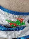 Peluche Taz Space Jam 1996 Warner Bros et McDonald's avec maillot de basket blanc et bleu, étiquette d'origine présente