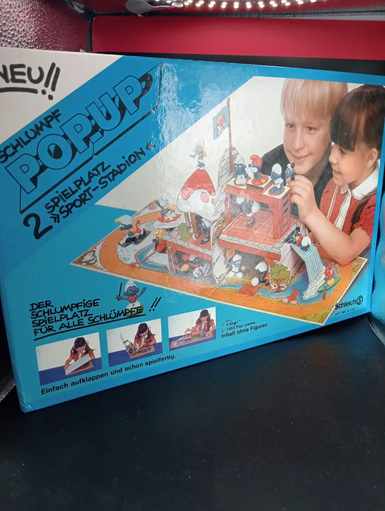 Schtroumpforama Pop-Up n°2 – Schleich 41102 – 1983 – aire de jeux Sport-Stadion – décor cartonné dépliant – sans figurines – boîte d’origine usée