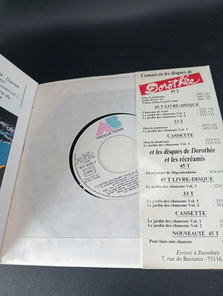 Livre-disque Le Centième Schtroumpf – Dorothée – Peyo – AB Productions 821339-7 – 45 tours avec livret illustré – couverture verte