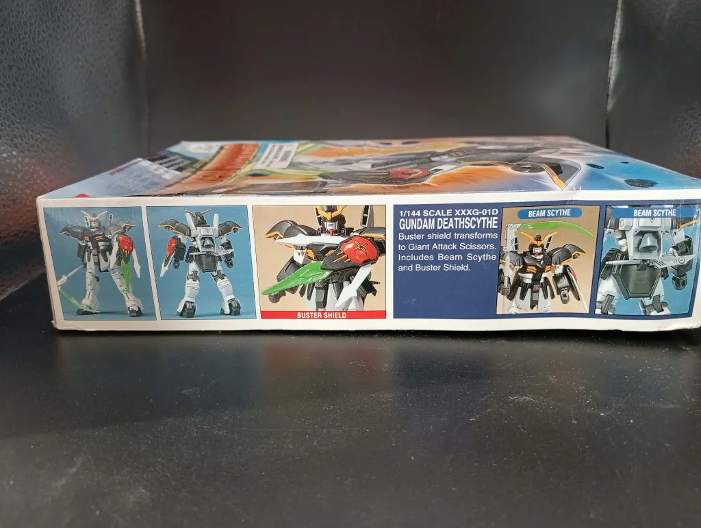 Gundam Deathscythe XXXG-01D Bandai 1995 à l’échelle 1/144, maquette montée avec faux, bouclier, boîte et notice d’origine