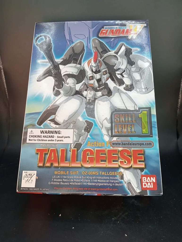 Maquette Tallgeese OZ-00MS Gundam Wing Bandai 1995 échelle 1/144 montée avec canon, bouclier, boîte, notice et pièces restantes sur grappes