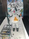 Maquette Tallgeese OZ-00MS Gundam Wing Bandai 1995 échelle 1/144 montée avec canon, bouclier, boîte, notice et pièces restantes sur grappes