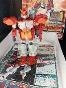 Gundam Heavyarms XXXG-01H Bandai 1995 à l’échelle 1/144, maquette montée en boîte avec petite cassure sur l’emblème jaune de la tête