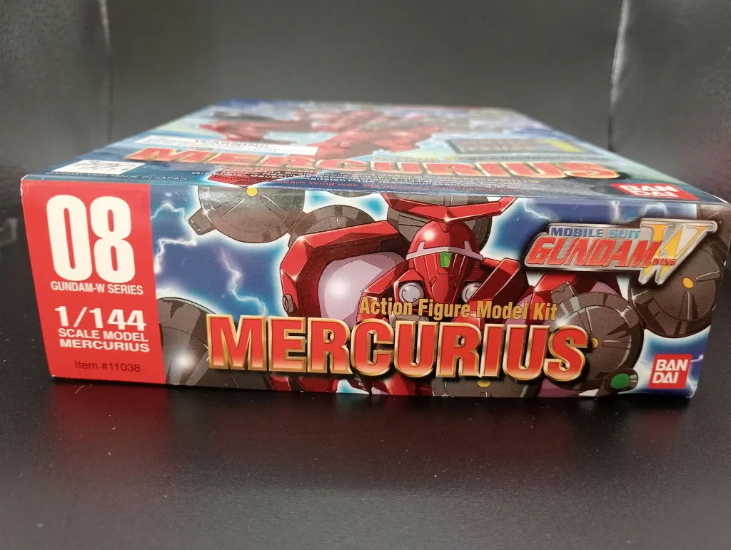 Maquette Gundam Mercurius OZ-13MSX2 Bandai 1995 échelle 1/144, montée en rouge avec arme, bouclier, boîte et notice d’origine