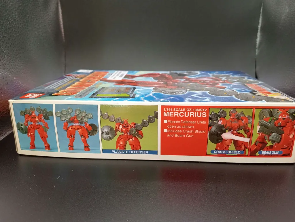 Maquette Gundam Mercurius OZ-13MSX2 Bandai 1995 échelle 1/144, montée en rouge avec arme, bouclier, boîte et notice d’origine