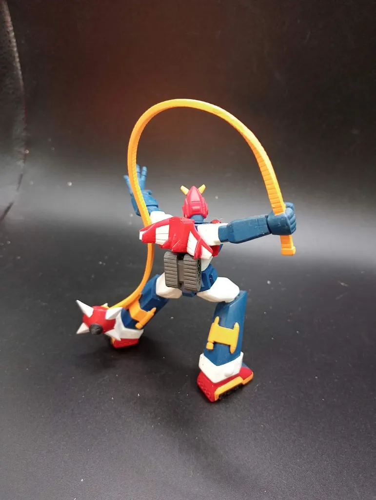 Figurine Voltes V Bandai Best Posing Collection 2003 en PVC rigide bleu rouge et blanc, présentée avec fouet orange et masse d’armes