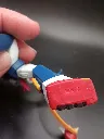 Figurine Voltes V Bandai Best Posing Collection 2003 en PVC rigide bleu rouge et blanc, présentée avec fouet orange et masse d’armes