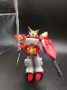 Maquette Gundam Heavyarms XXXG-01H Bandai 1995 à l’échelle 1/144, montée en rouge et blanc avec Gatling noire, bouclier rouge et longue lame grise, sans boîte