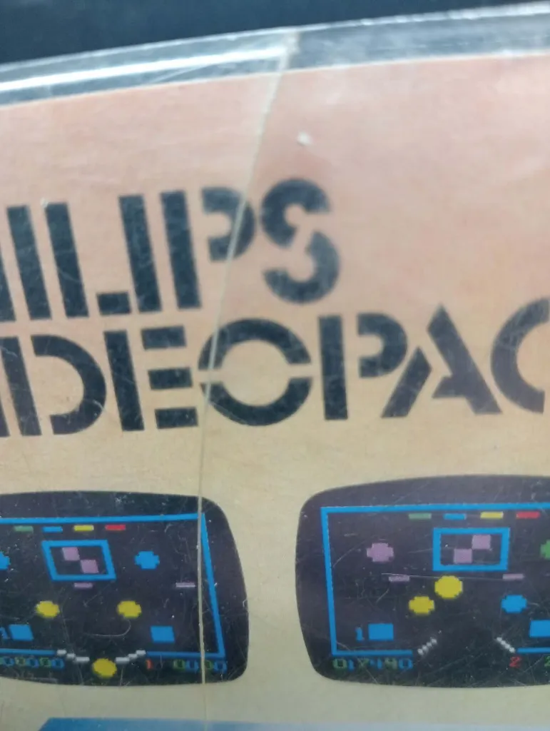 Juego retro Philips Videopac 24 Flipper de 1980 con cartucho negro, caja ilustrada con máquina de pinball y manual original