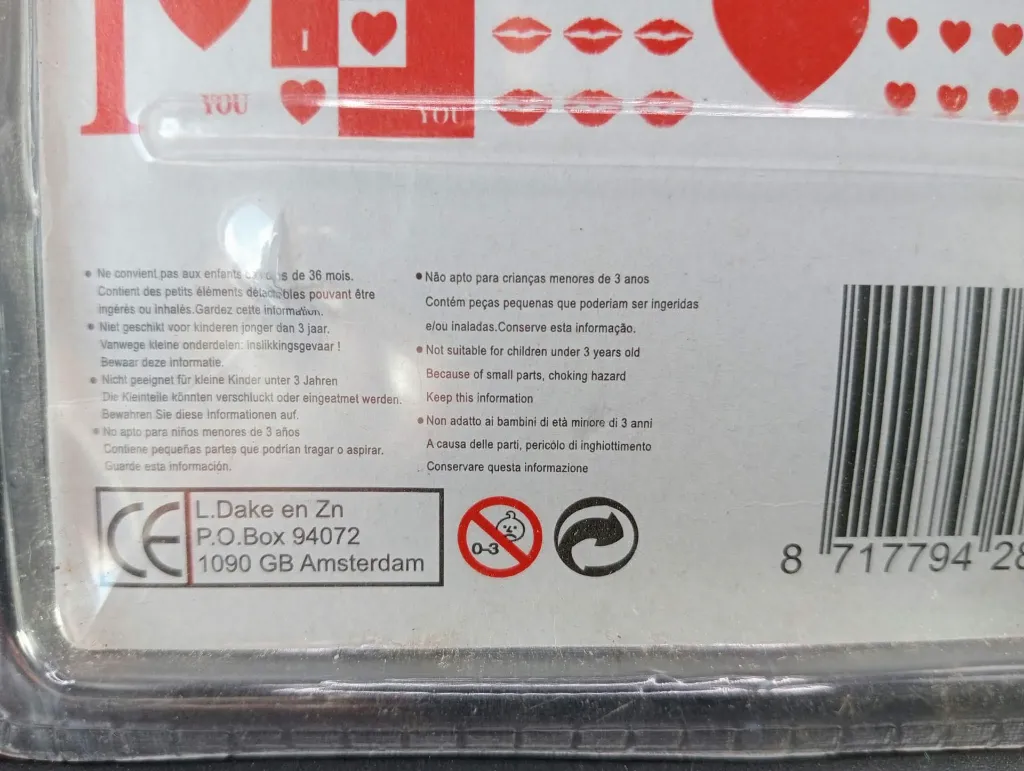 Grey 3 × 3 I Love You puzzle cube with red letters and hearts, new in sealed transparent blister with red heart and lips artwork