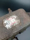 Antique Metabo breast drill in heavily oxidised metal with two-speed gearbox, crank handle, chest plate and worn wooden handles