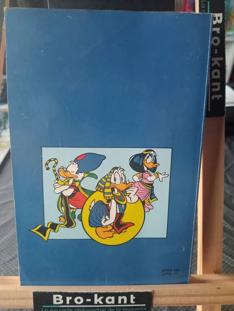 Banda desenhada alemã Walt Disney Lustiges Taschenbuch número 187 Der Held der Pharaonen de 1993 com Donald Duck vestido de faraó diante das pirâmides e capa azul gasta