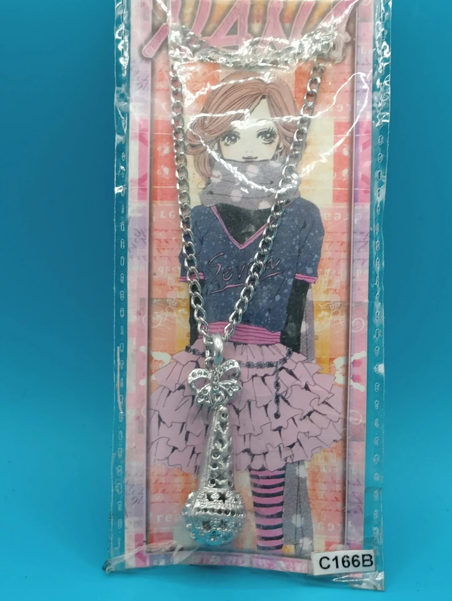 Colar com pingente "microfone" C166B – bijuteria estilo manga, embalagem original