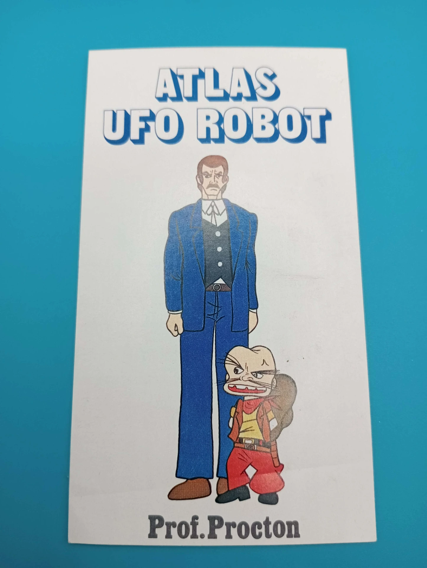 Autocolante vintage Prof. Procton – Atlas UFO Robot – 10,5×6 cm – anime cult 1978