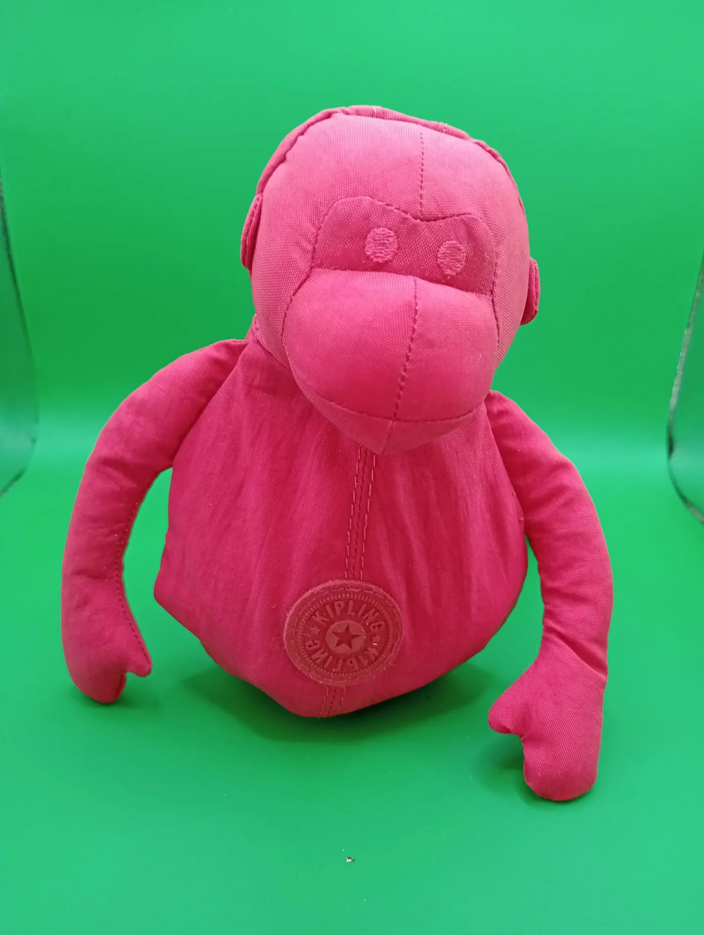 Ensemble Kipling rose vif : sac et singe en peluche