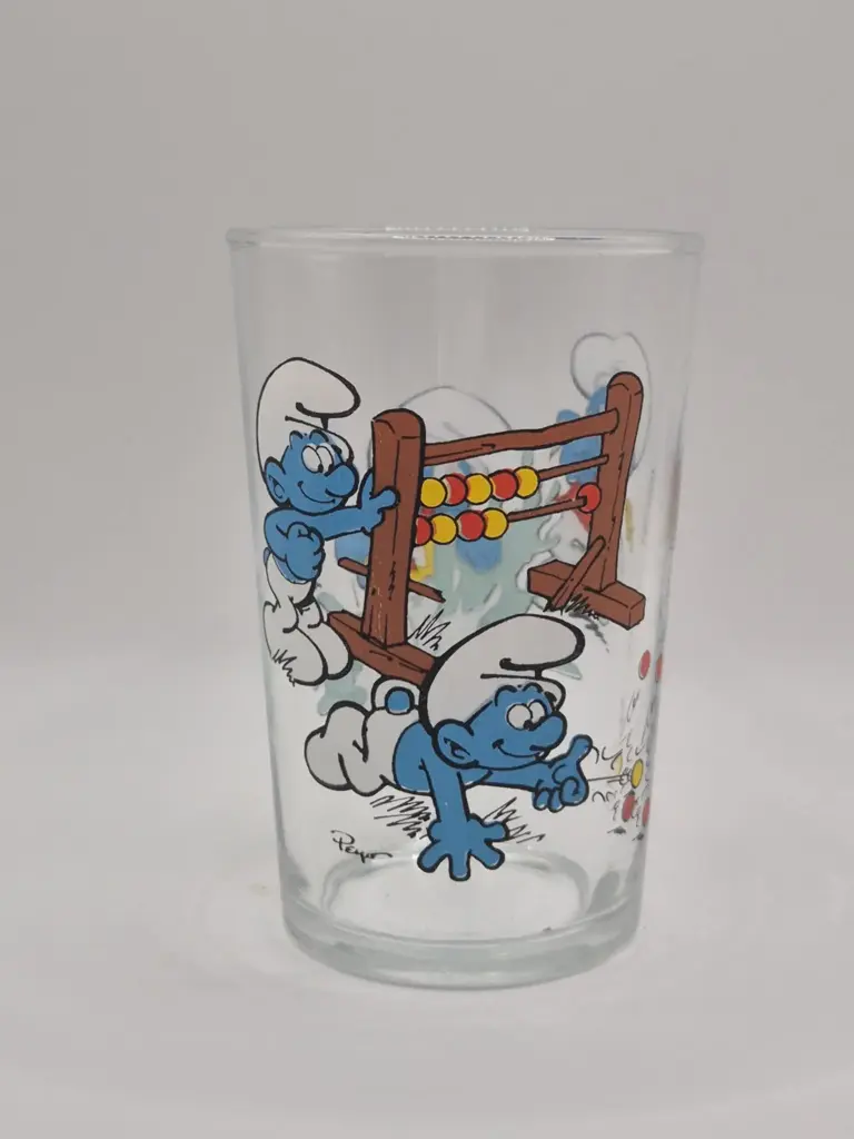 Vaso Bénédictin Pitufos 1991 – juegos de canicas y pequeños Pitufos