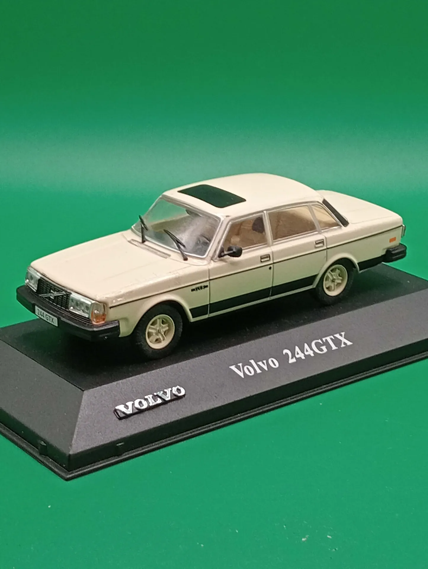 Volvo 244GTX (1/43) — cream die-cast sedan