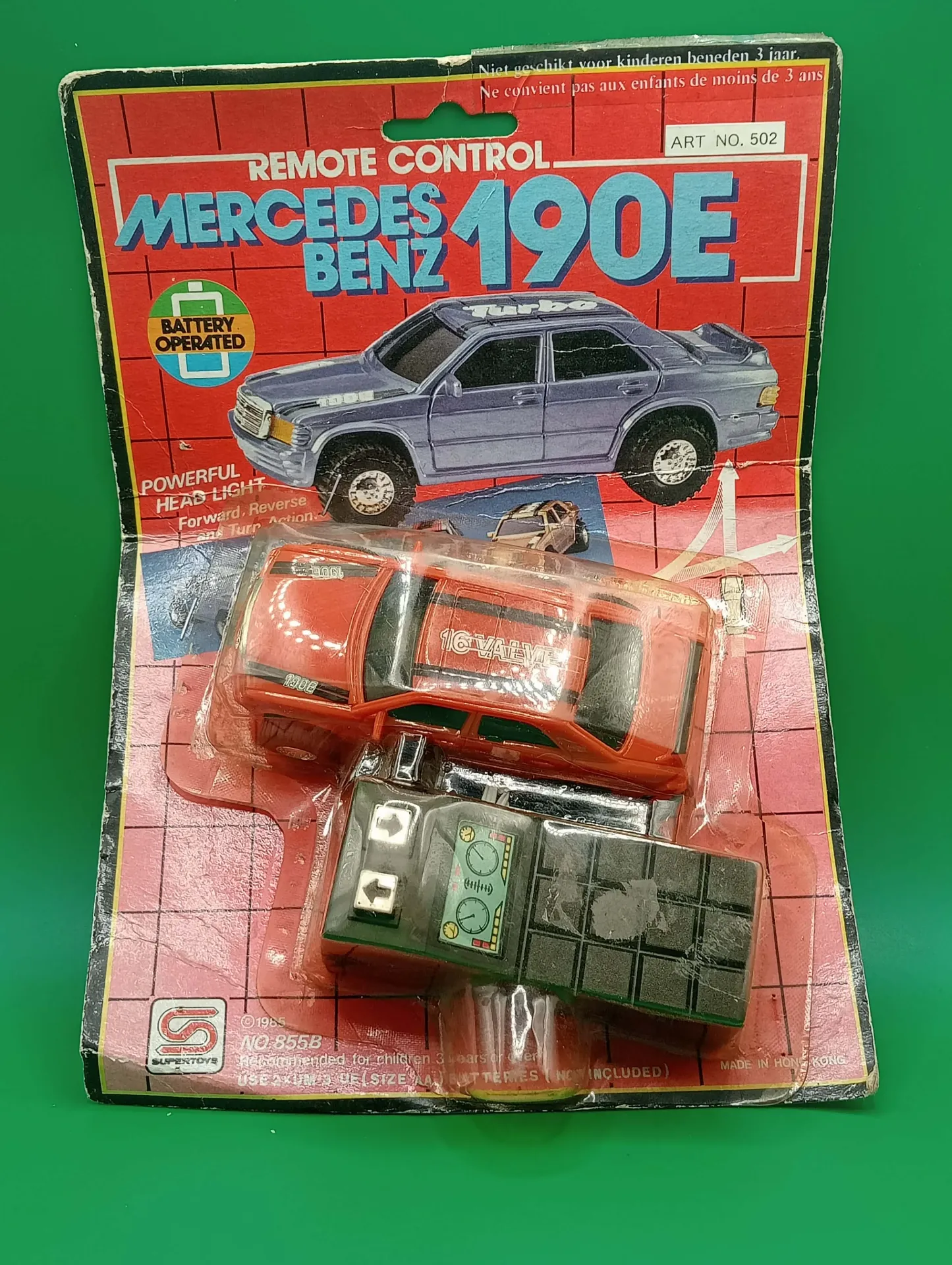 Mercedes-Benz 190E RC con cable (1985, Hong Kong) — blister vintage (rouge)