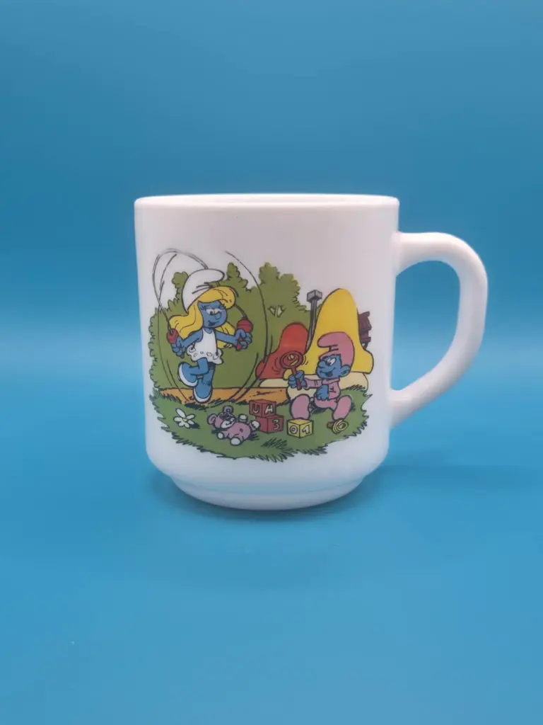 Caneca Smurfs Bénédictin 1984 – Smurfs divertem o Bebê Smurf
