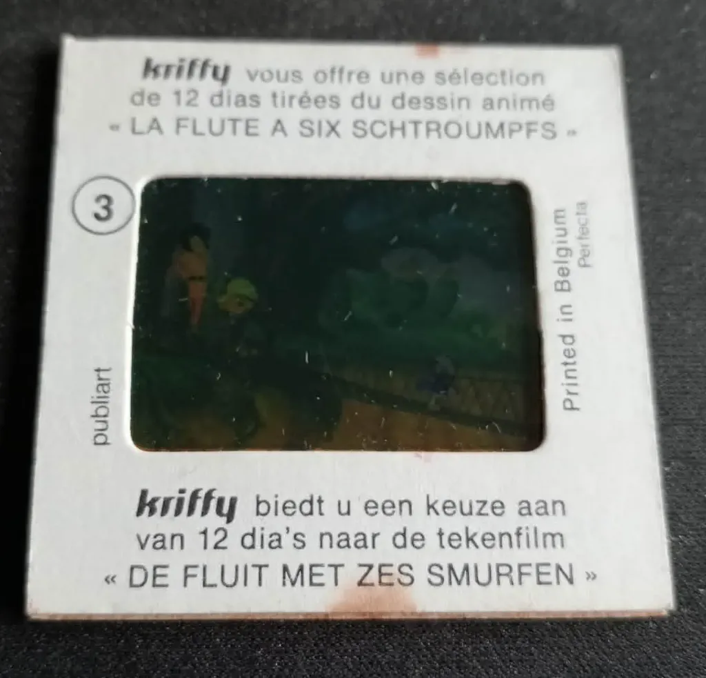 Diapositiva Kriffy n. 3 – Il flauto a sei Puffi – Publiart / Perfecta – Belgio 1975
