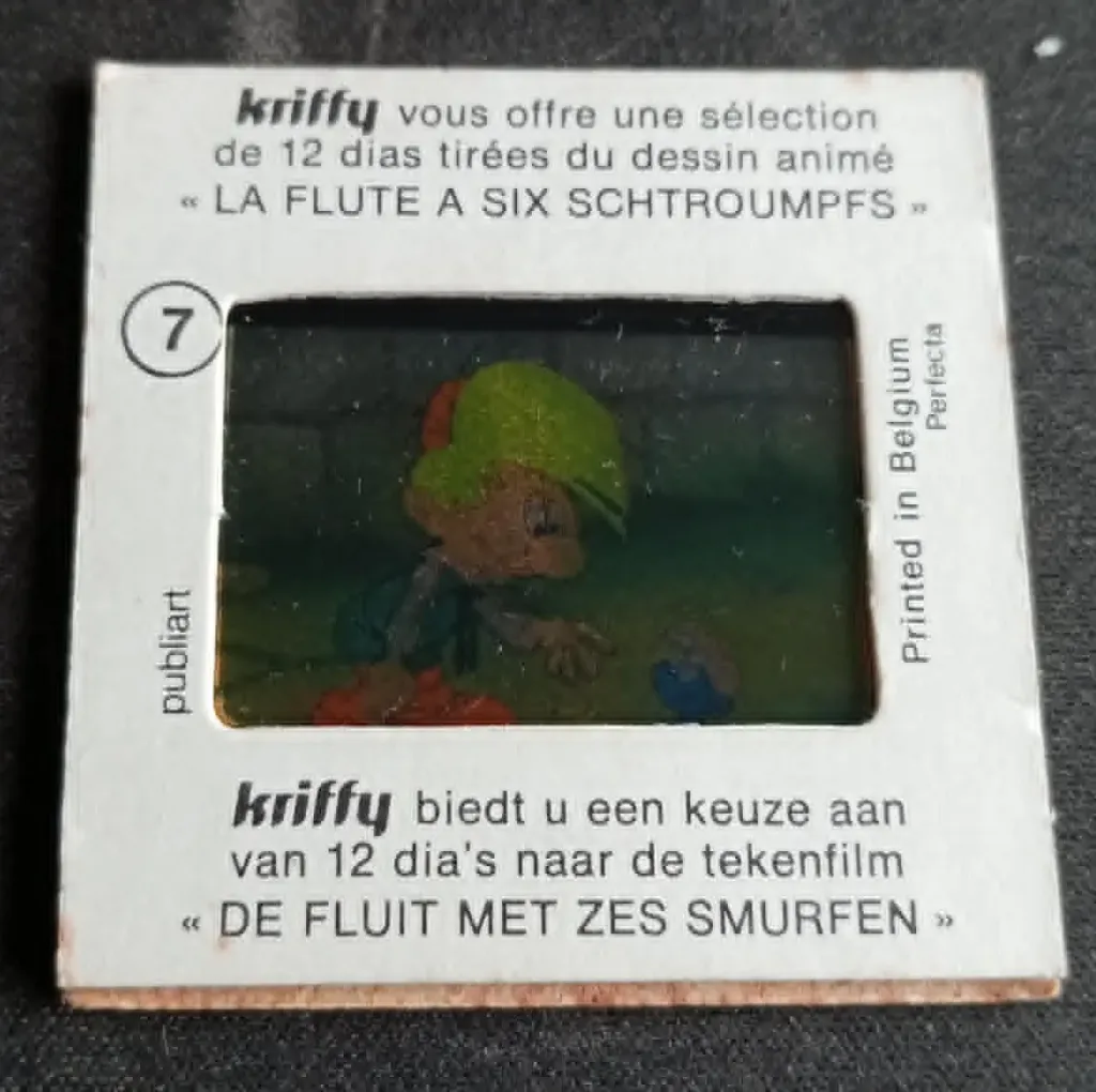 Diapositiva Kriffy n. 7 – Il flauto a sei Puffi – Publiart / Perfecta – Belgio 1975