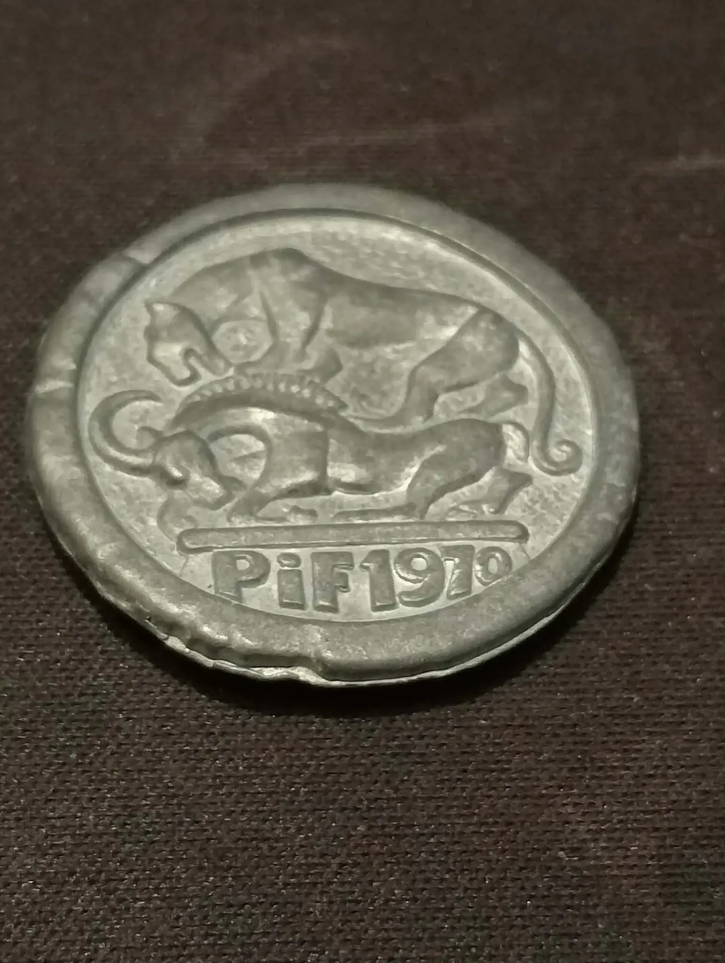 Ficha publicitária Pif 1970 em chumbo