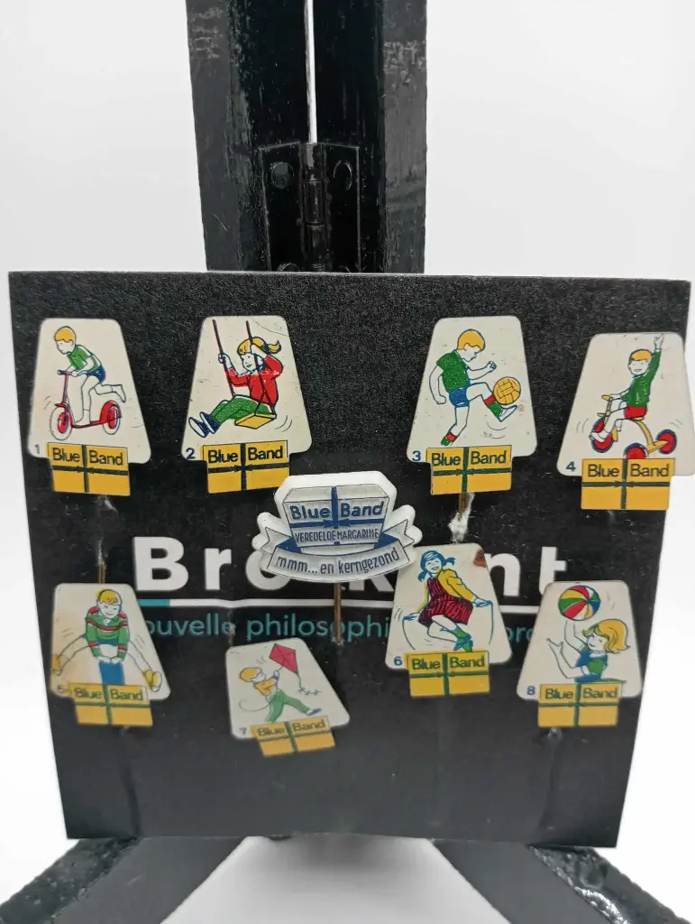 Lote de 9 prendedores Blue Band – personajes vintage