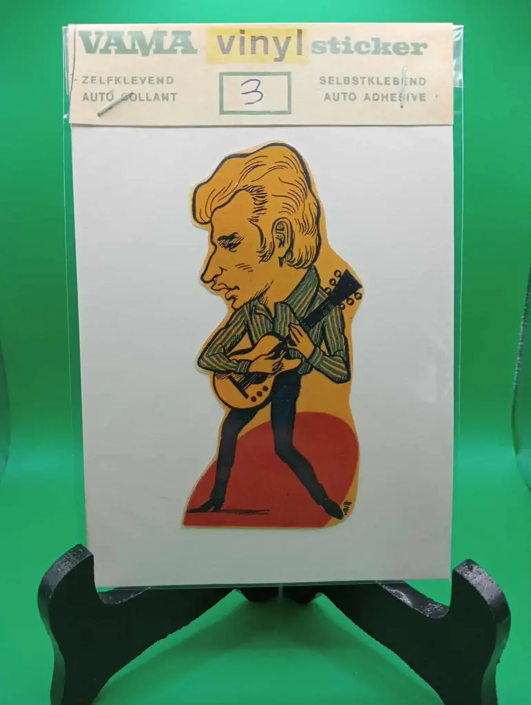 🎤 Autocollant vintage VAMA – Johnny Hallyday en version caricature rock – Années 70