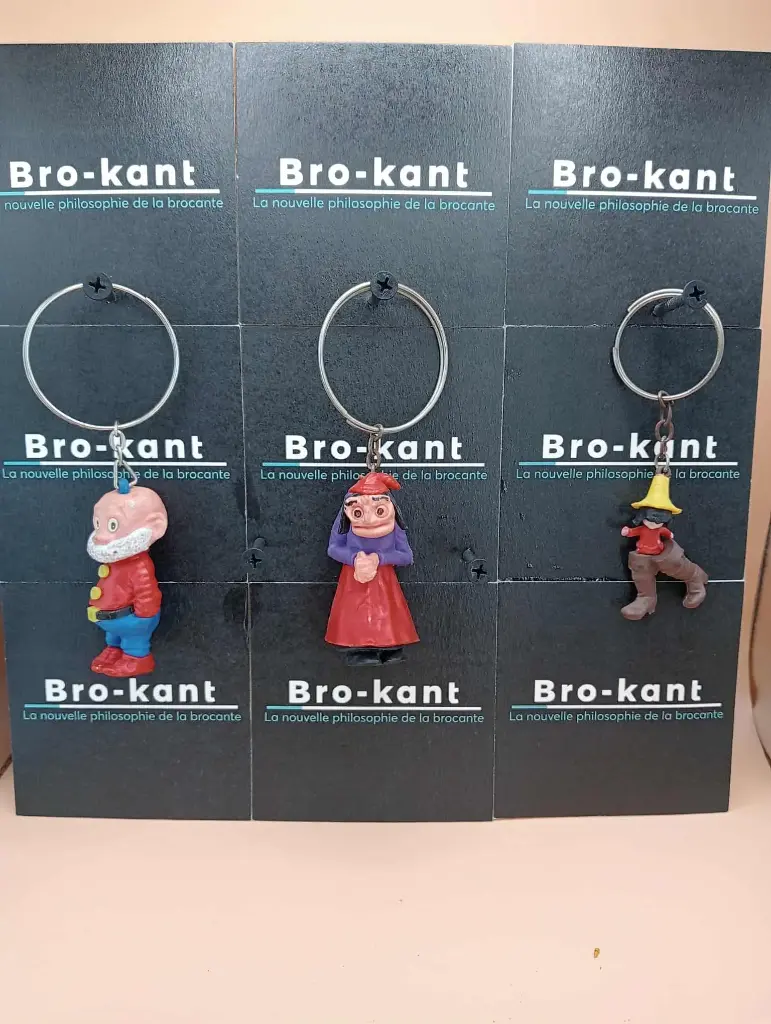 set of 3 Calvé keychains 1968