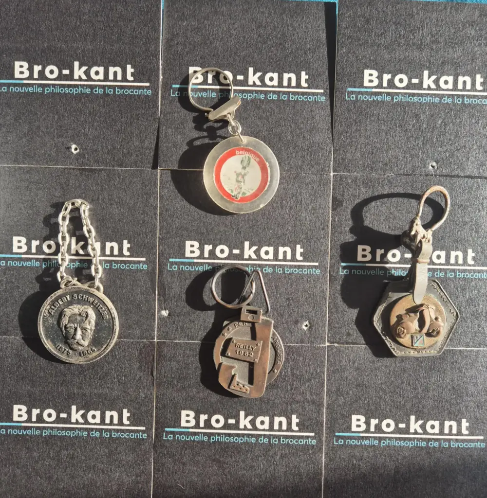 4 vintage keychains: history, folklore, and retro scooter