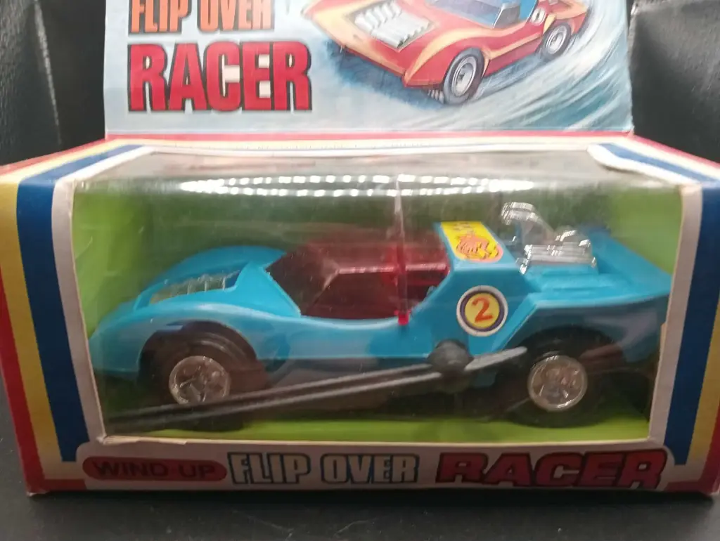 Carro de brinquedo Flip Over Racer com mola + caixa (vintage)