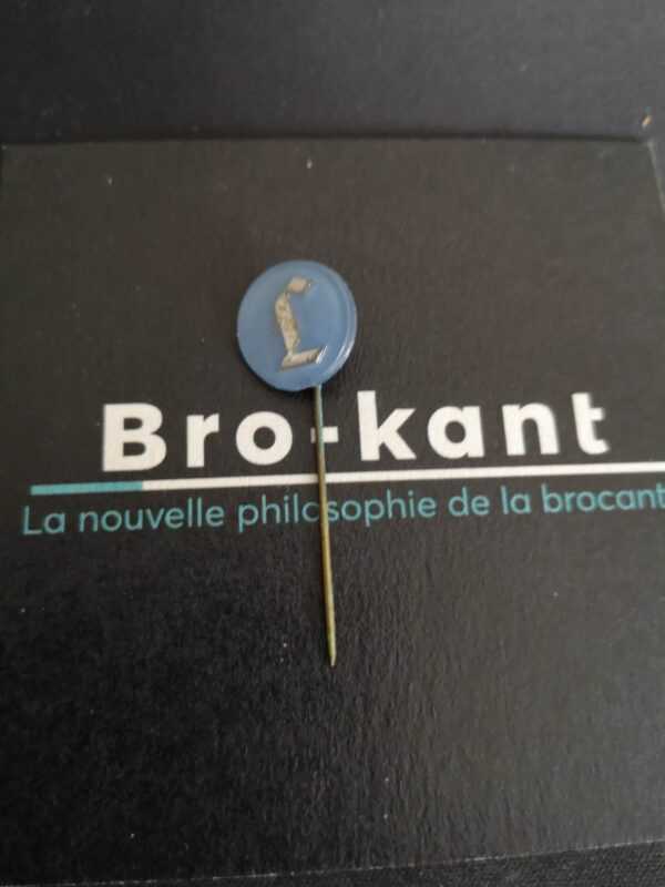 Luycks rond bleu lettre argenté