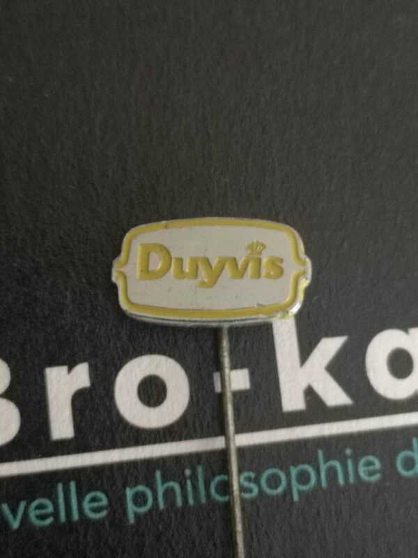 Duyvis-écriture jaune sur fond argenté